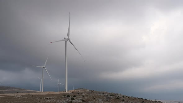 Windmills With Storm Clouds in the Background
