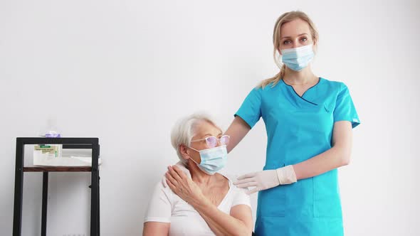 Young Blond Nurse Supporting Senior Woman Medium Shot White Background Medical and Senior People