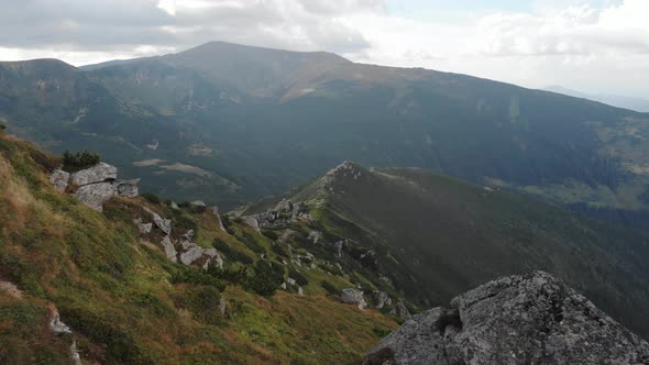 Landscape of Rocky Mountains and Cloudy Sky