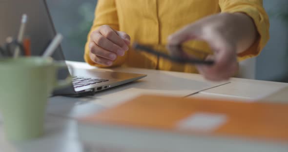 Woman sending messages with her smartphone