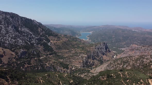 Aerial Nature Greek Landscape with Sea Mountain Olive Trees and Houses in Crete