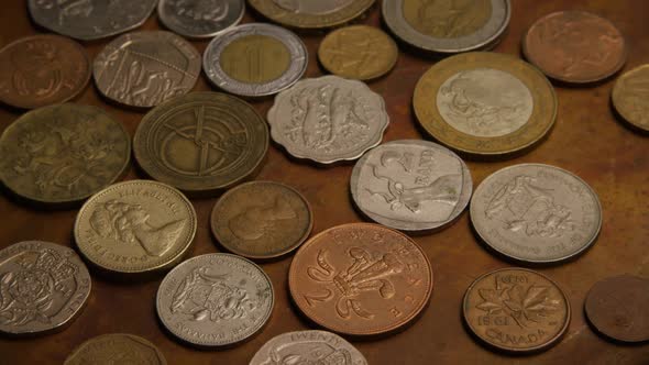 Rotating stock footage shot of international monetary coins - MONEY 0385