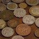 Rotating stock footage shot of international monetary coins - MONEY 0385 - VideoHive Item for Sale