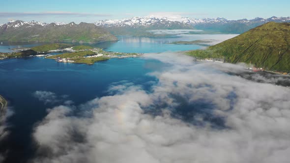 Aerial view of Unalaska Bay with fog on Unalaska island, Alaska, United States.