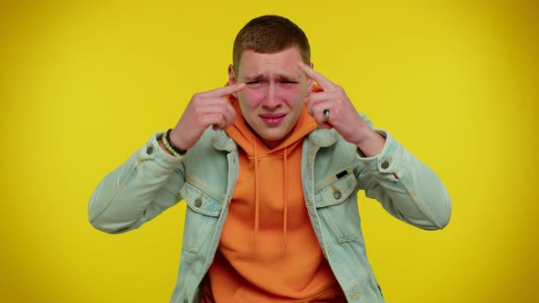 Teen Man in Jacket Pointing at Camera and Showing Stupid Gesture Blaming Some Idiot for Insane Plan