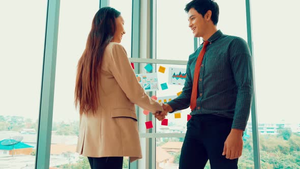 Business People Handshake in Corporate Office
