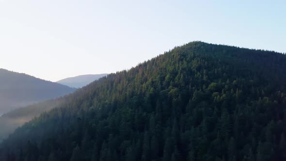 Mountain Peaks and Morning Sky with Smooth Moving Clouds