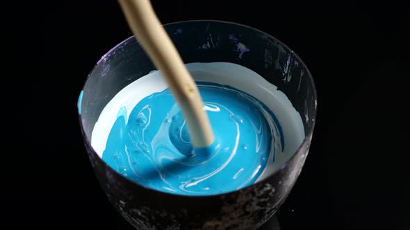 Mixing Paint with Stick