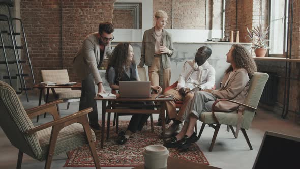 Cheerful Multi-Ethnic Team of Coworkers Posing for Camera