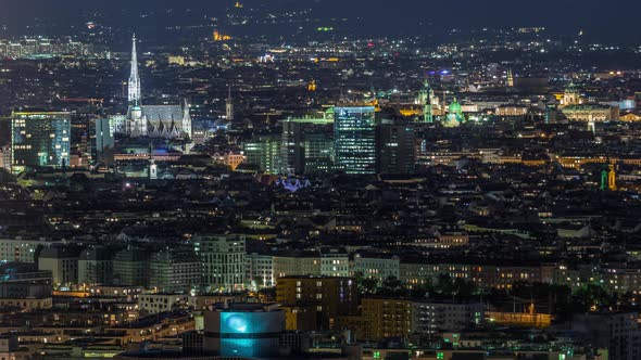 Aerial Panoramic View Over Vienna City with Skyscrapers Historic Buildings and a Riverside Promenade