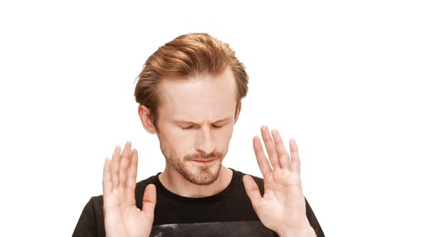 Upset Young Handsome Man Over White Background