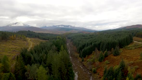 Aerial view of Laggan dam artificial lake and beautiful countryside and wood