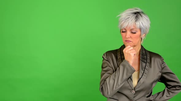 Business Middle Aged Woman Thinking - Green Screen - Studio