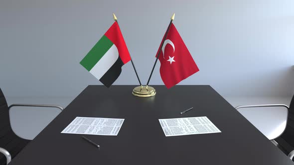 Flags of the United Arab Emirates and Turkey and Papers alt