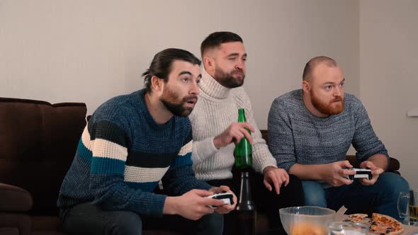 Young Caucasian Males Plays Videogame