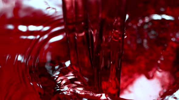 Super Slow Motion Detail Shot of Pouring Red Wine at 1000Fps.