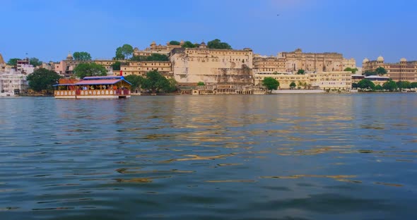 Ghat and Udaipur City Palace on Lake Pichola - Rajput Architecture of Mewar Dynasty Rulers of