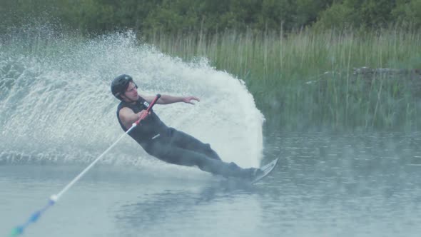 Amazing low angle waterski slalom cut SLOW MOTION spray