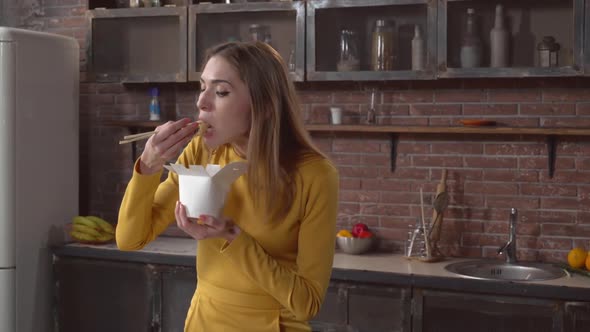 Female Enjoy Meal in Flat.