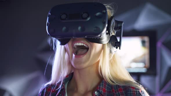 Modern Interactive Technologies, Female Puts on Virtual Reality Glasses, Exploring the Virtual Space