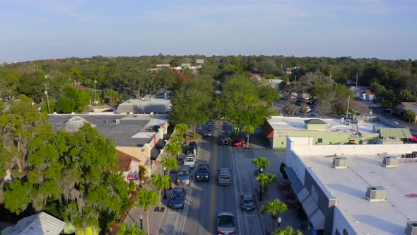 Forward Aerial Pan of the Main Road in a Small Town in Florida