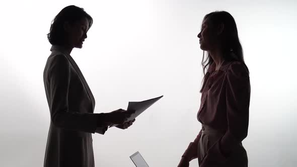 Two business partner shake hands when meeting in office, slow motion	