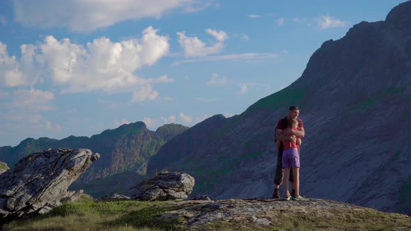 Father and Daughter Are Traveling in the Mountains