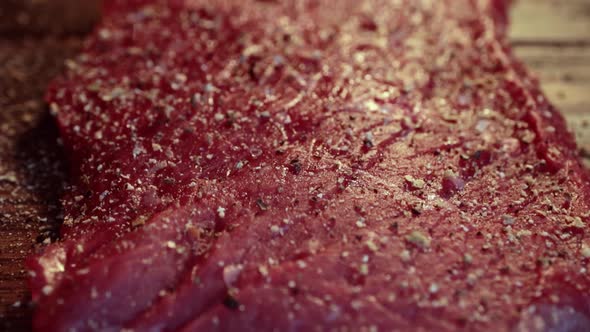 Mixed Pepper and Spices on the Raw Meat Steak