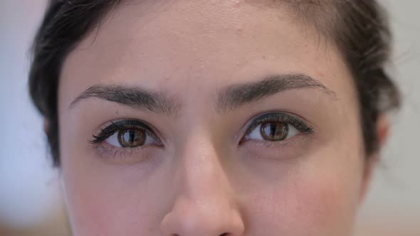 Close up of Blinking Eyes of Young Indian Woman