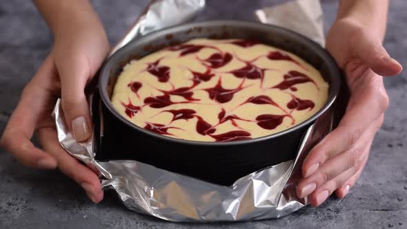 Woman Preparing Cheesecake Berry Sauce Kitchen