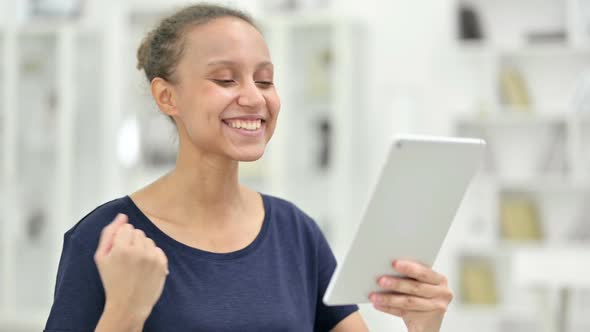 Portrait of African Woman Doing Video Call on Digital Tablet