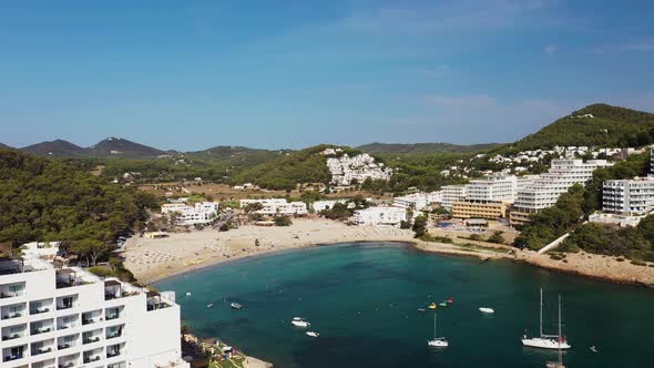 Aerial footage of the Spanish island of Ibiza showing the beautiful beach front