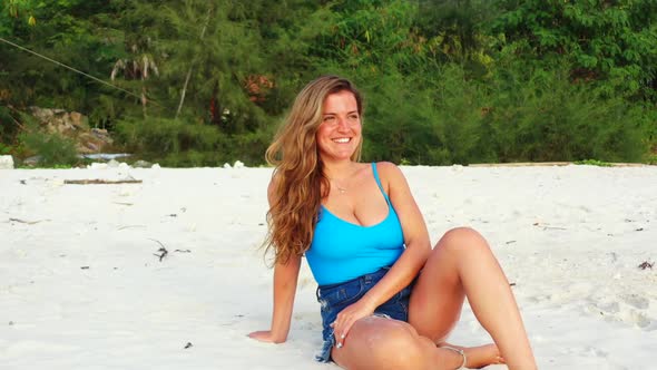 Female models tan on perfect tourist beach adventure by clear ocean and white sand background of Koh