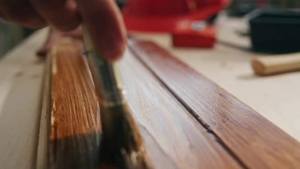 Varnishing Wooden Board Closeup