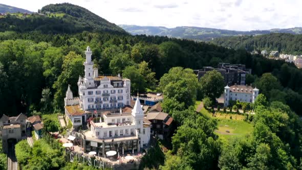Aerial hyper lapse of beautiful castle hotel in Luzern, Switzerland