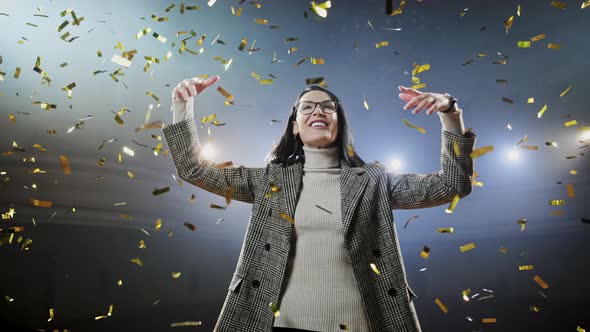 Successful Businesswoman with Arms Up Celebrating His Victory. View of Excited Young Businesswoman