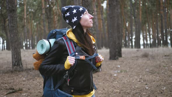 Young Woman Hiking Nature in Pine Forest