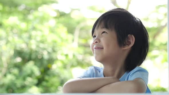 Cute Asian Child With A Glass Of Milk Slow Motion 