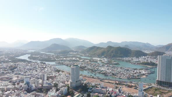 Aerial Drones Take a Beautiful View of the City From a Bird's Eye View with Skyscrapers or Tall