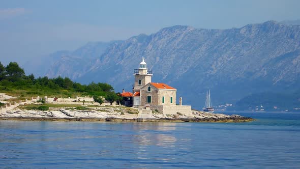 Small lighthouse on the shore.