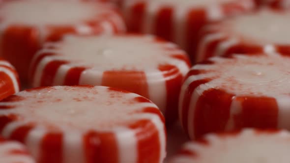 Rotating shot of peppermint candies - CANDY PEPPERMINT 047