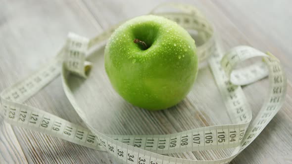 Green Apple and Tape Measure 