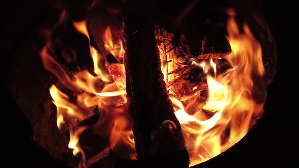 Wood logs on fire, slow motion