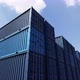 Dolly zoom in the stack of blue container boxes with sky background - VideoHive Item for Sale