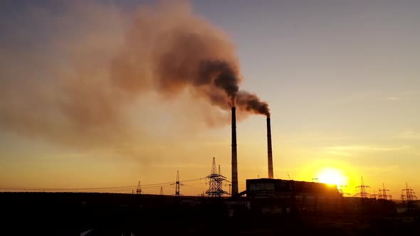 Dark industrial factory in the evening. Metallurgical plant. 