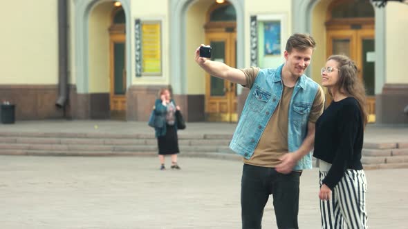 Young Beautiful Couple Taking Selfie Outdoor in the City