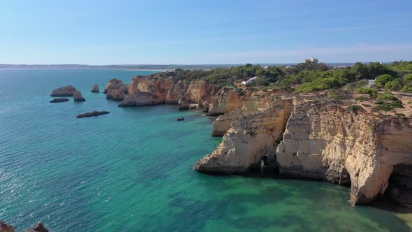 Delightful Aerial View of Portuguese Rocky Beaches Near the City of Portimao