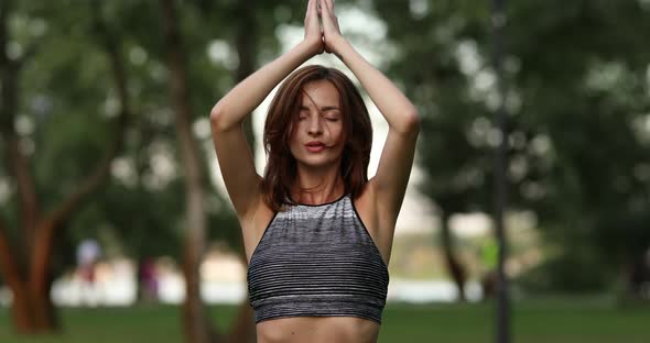 The Girl Makes a Deep Entrance and Meditates.