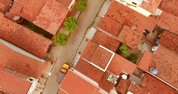 Aerial view of rooftops and small streets of Rio do Fogo town, Brazil.