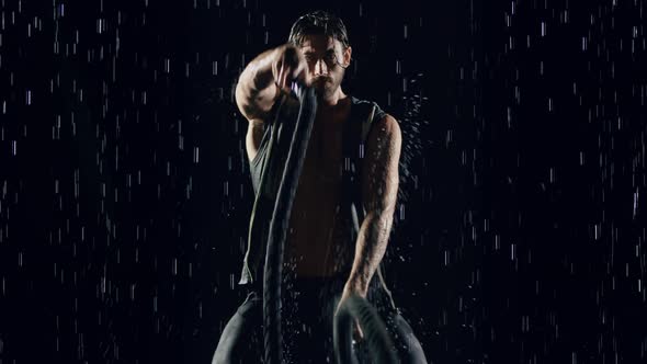 Athletic Man Working Out In The Rain